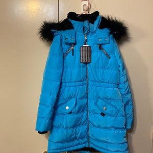 Warm winter coat lined with black fur for girls size 12 in new condition